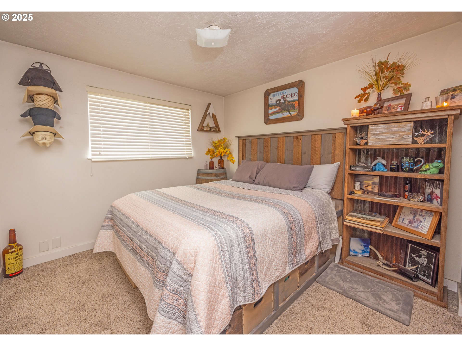 824 56th Street Springfield, OR 97478 - Photo 14 of 31 a bedroom with a bed and a book shelf