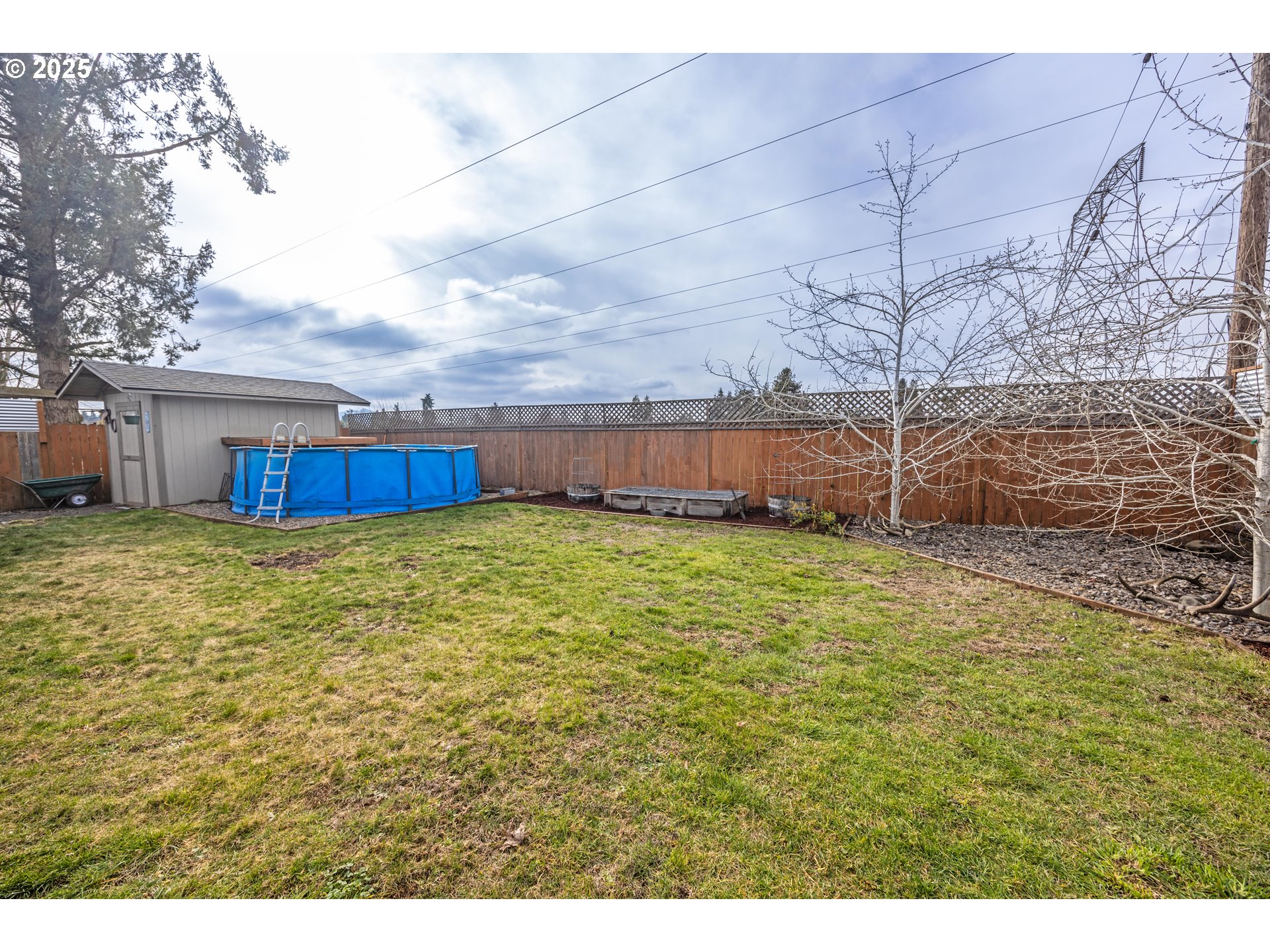 824 56th Street Springfield, OR 97478 - Photo 24 of 31 a view of a house with a yard