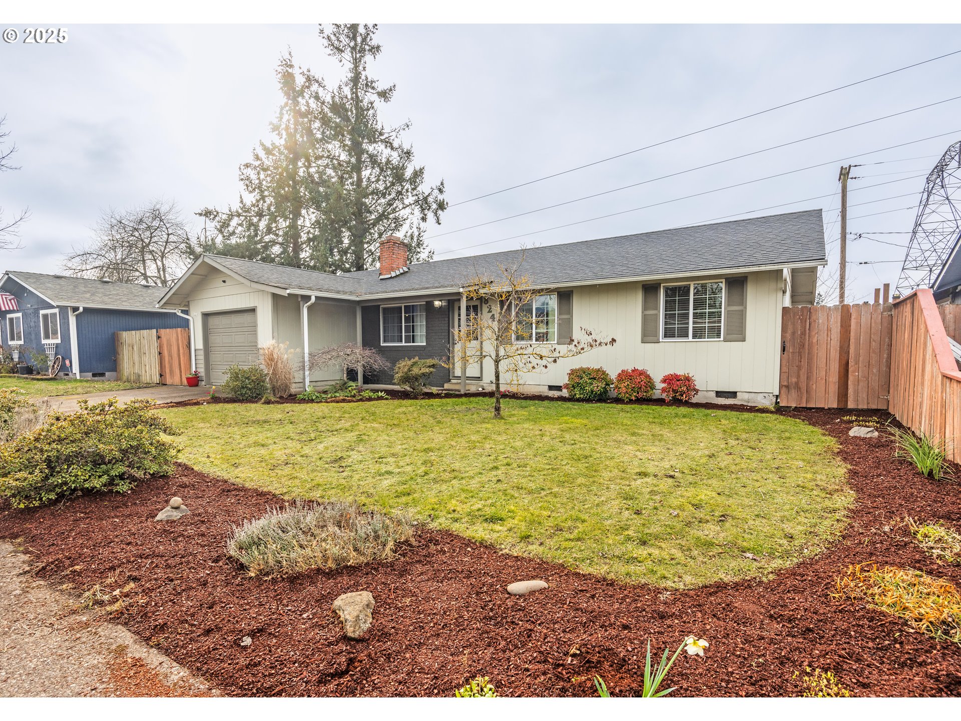 824 56th Street Springfield, OR 97478 - Photo 28 of 31 a front view of a house with swimming pool and porch