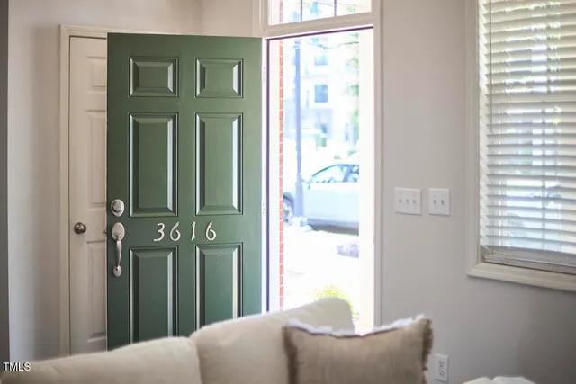 a living room with furniture and a table