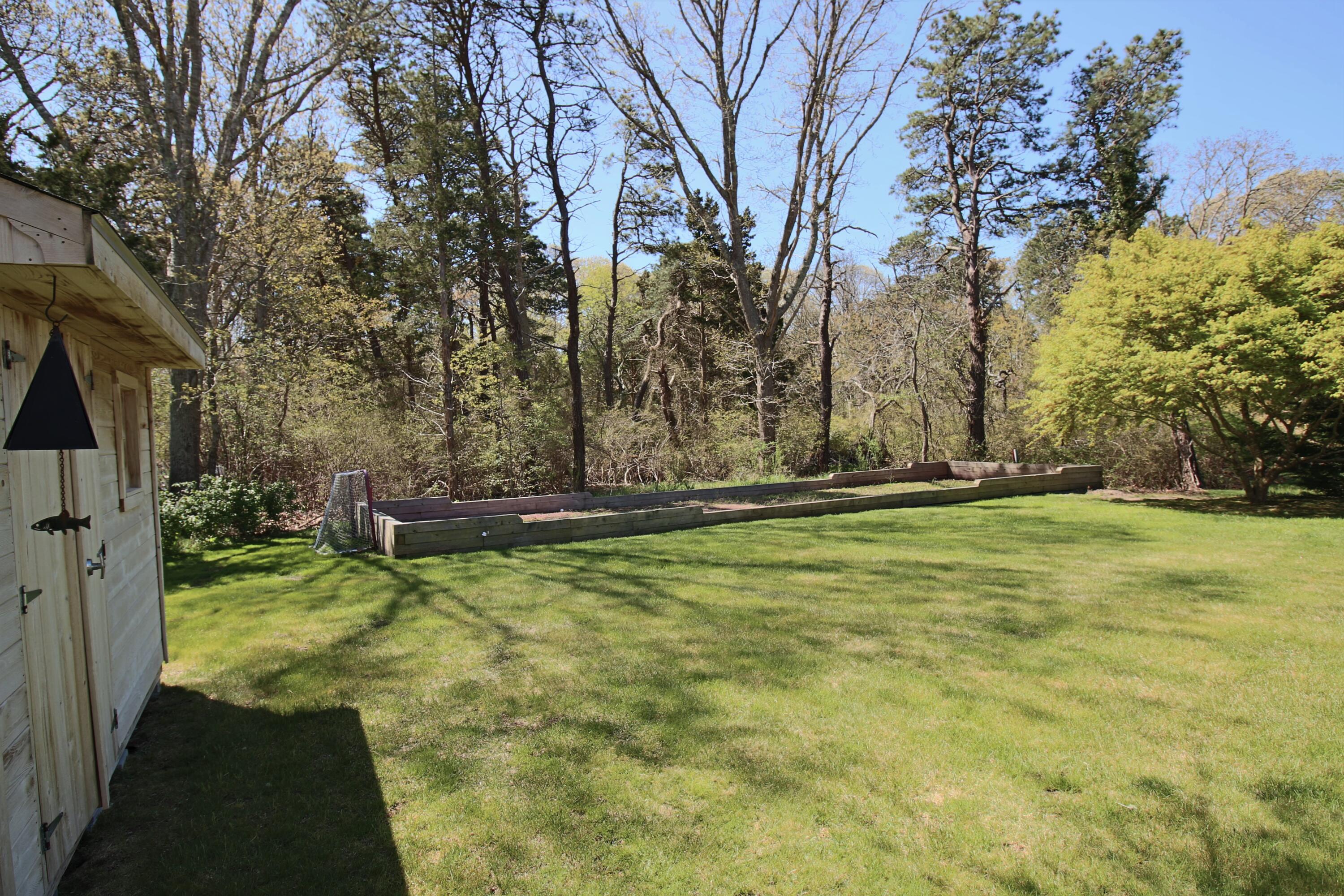 217 New Boston Road Dennis, MA 02638 - Photo 28 of 34 Shed to Horseshoe Pit