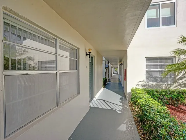 a view of a house with a street