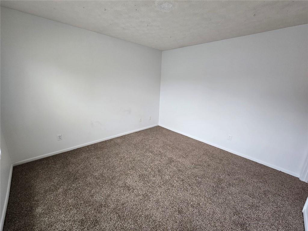 1297 Tree Creek Court Clarkston, GA 30021 - Photo 21 of 31 a view of empty room