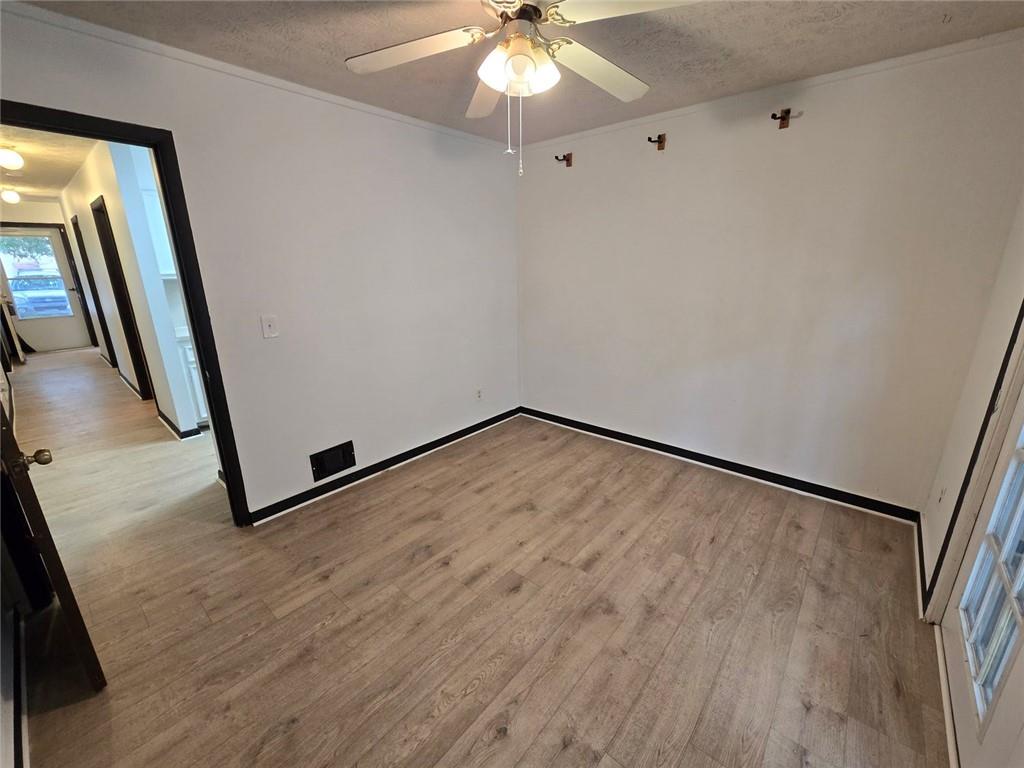 1297 Tree Creek Court Clarkston, GA 30021 - Photo 4 of 31 a view of an empty room with a window