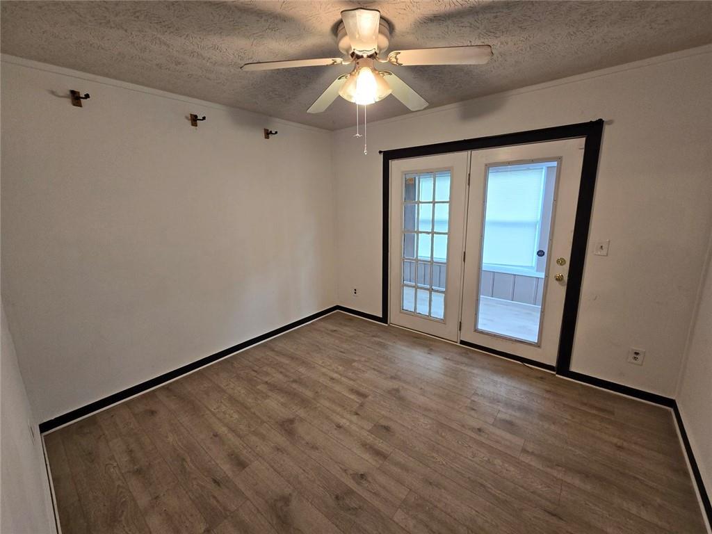 1297 Tree Creek Court Clarkston, GA 30021 - Photo 5 of 31 a view of an empty room with a window