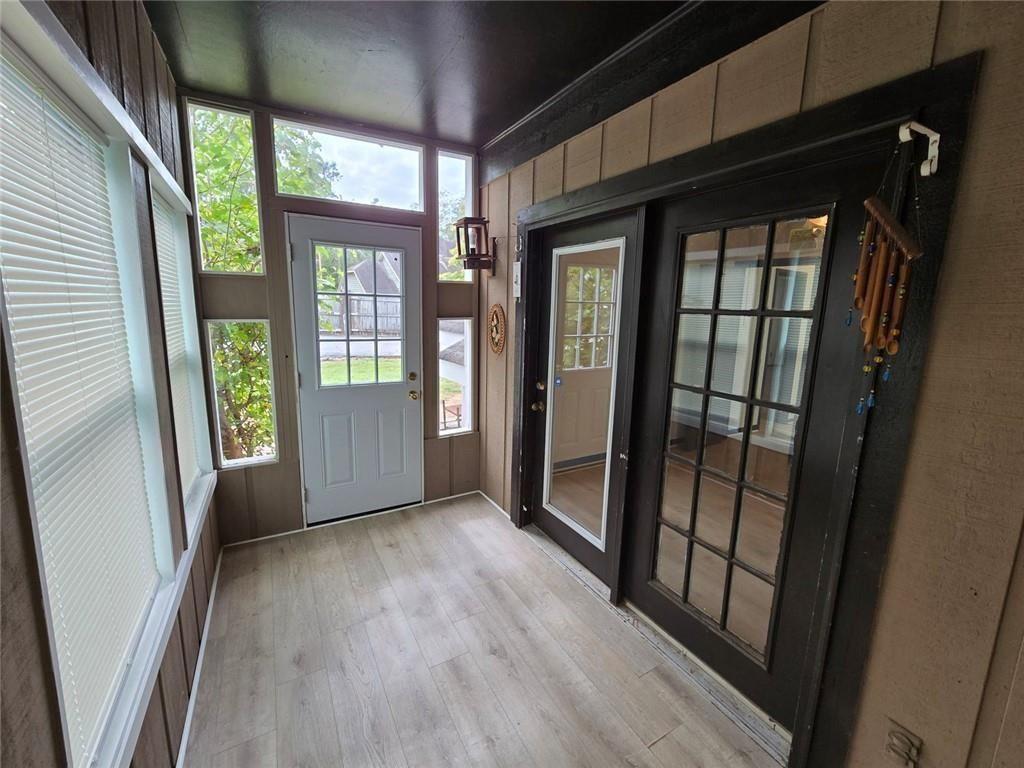 1297 Tree Creek Court Clarkston, GA 30021 - Photo 6 of 31 a view of an entryway door with wooden floor