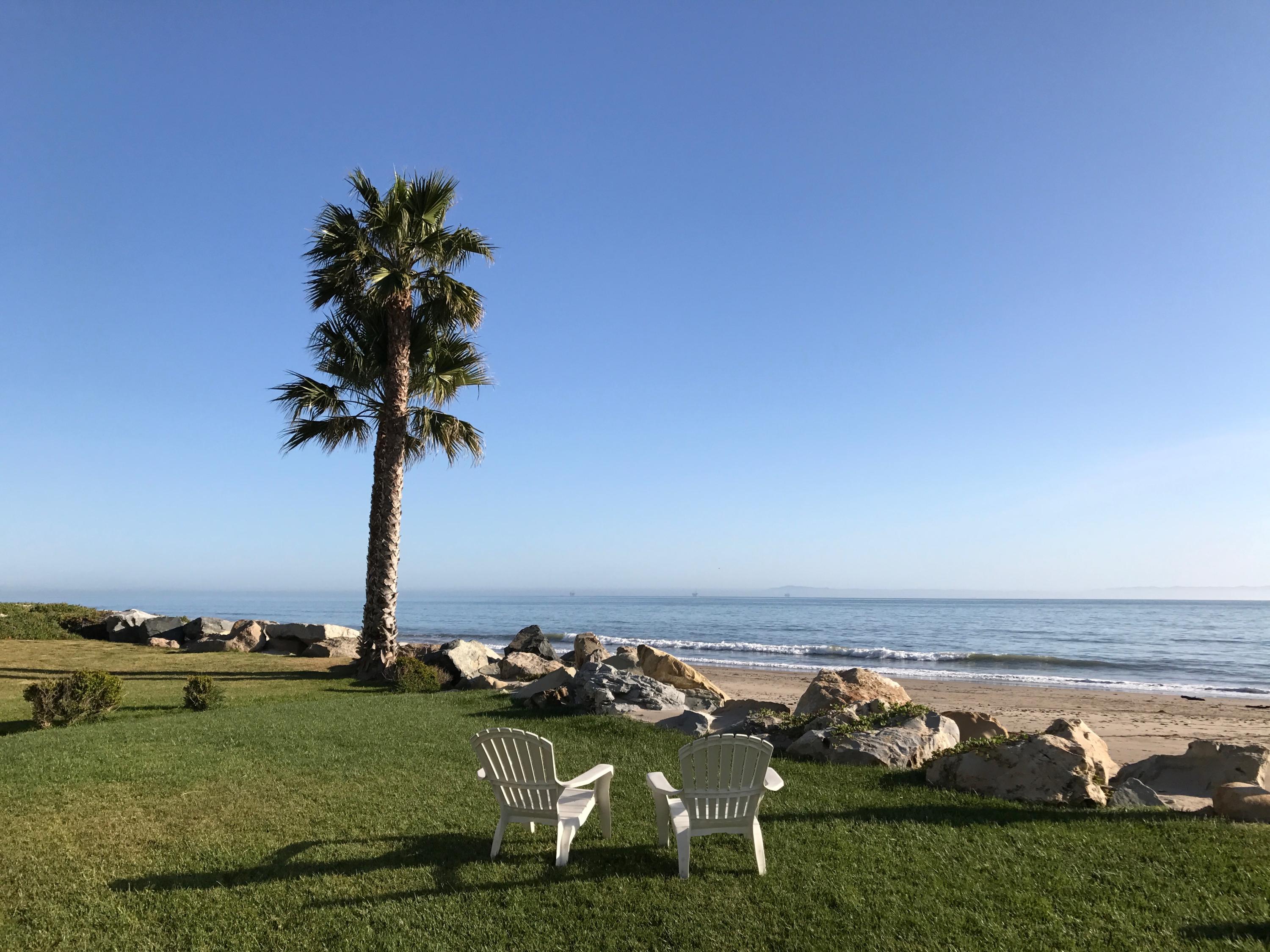 a view of a lake with a big yard