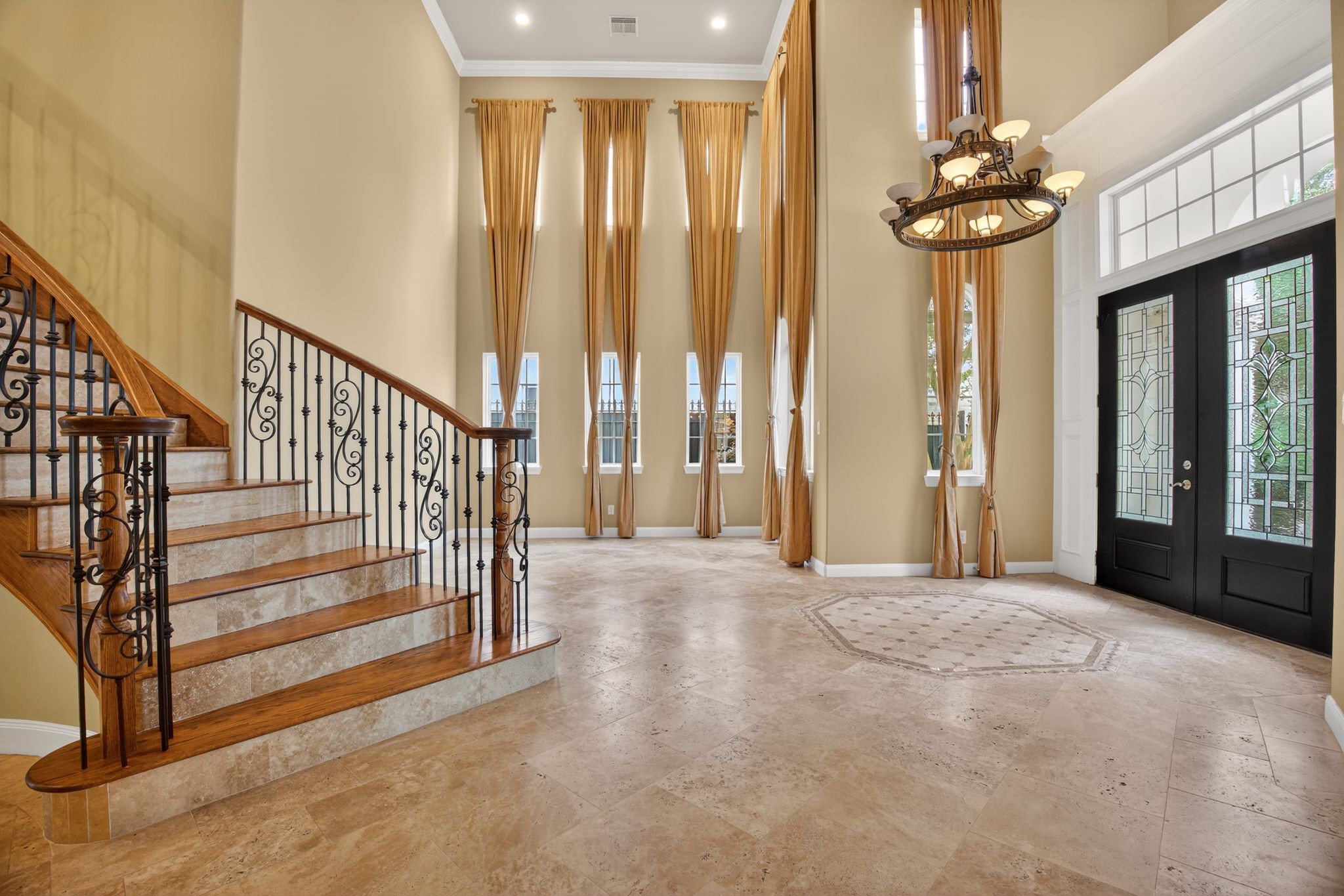11511 Gallant Ridge Lane Houston, TX 77082 - Photo 6 of 49 a view of a room with large windows and stairs