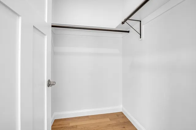 a view of small space with racks on the wall