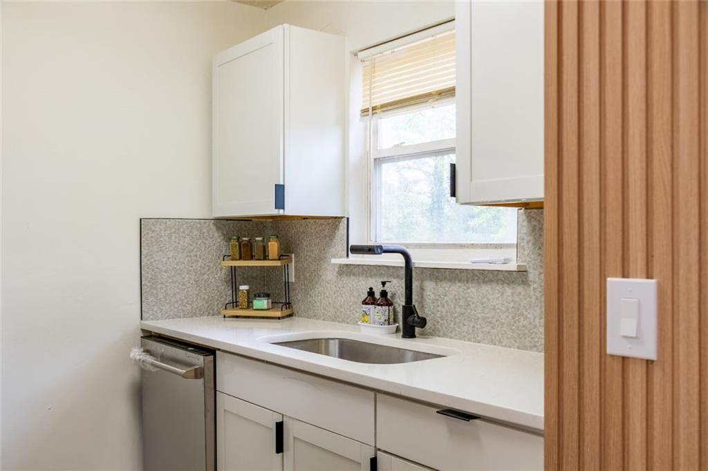 3493 Newberry Trail Decatur, GA 30034 - Photo 16 of 48 a bathroom with a sink and a mirror