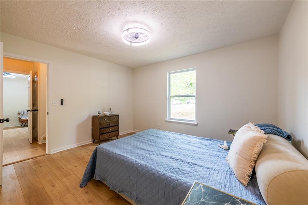 3493 Newberry Trail Decatur, GA 30034 - Photo 37 of 48 a bedroom with a bed and a window