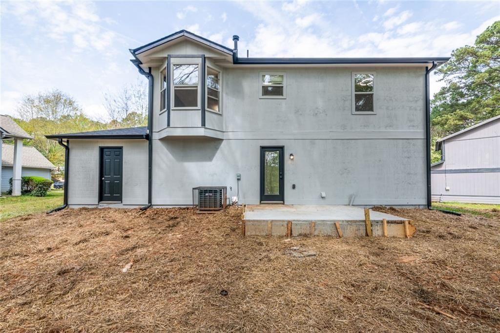 3493 Newberry Trail Decatur, GA 30034 - Photo 44 of 48 a front view of a house with a yard