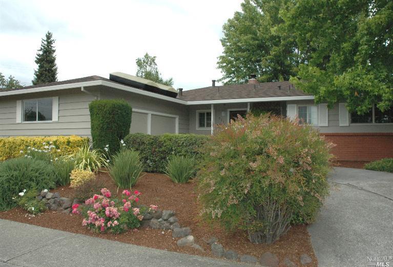 232 Grove Avenue Santa Rosa, CA 95409 - Photo 1 of 1 front view of house with a yard