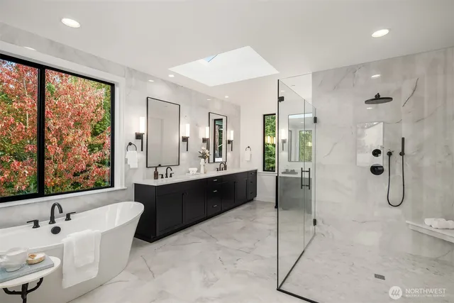 a bathroom with a double vanity sink mirror double shower and mirror
