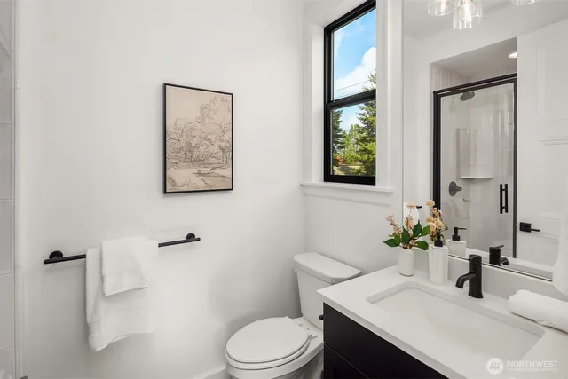 a view of a livingroom with wooden floor