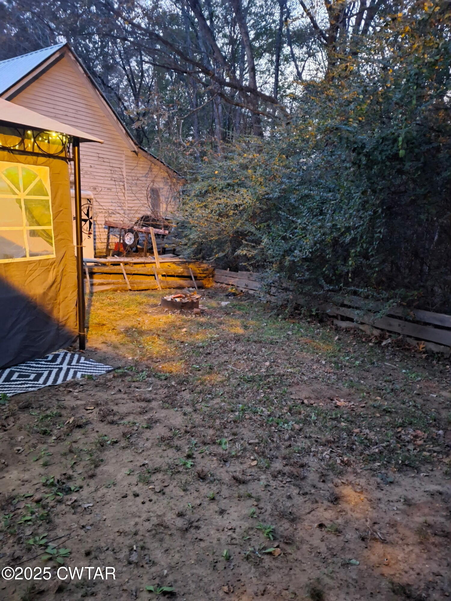 555 Center Point Road South Reagan, TN 38368 - Photo 17 of 17 a view of swimming pool with lawn chairs under an umbrella
