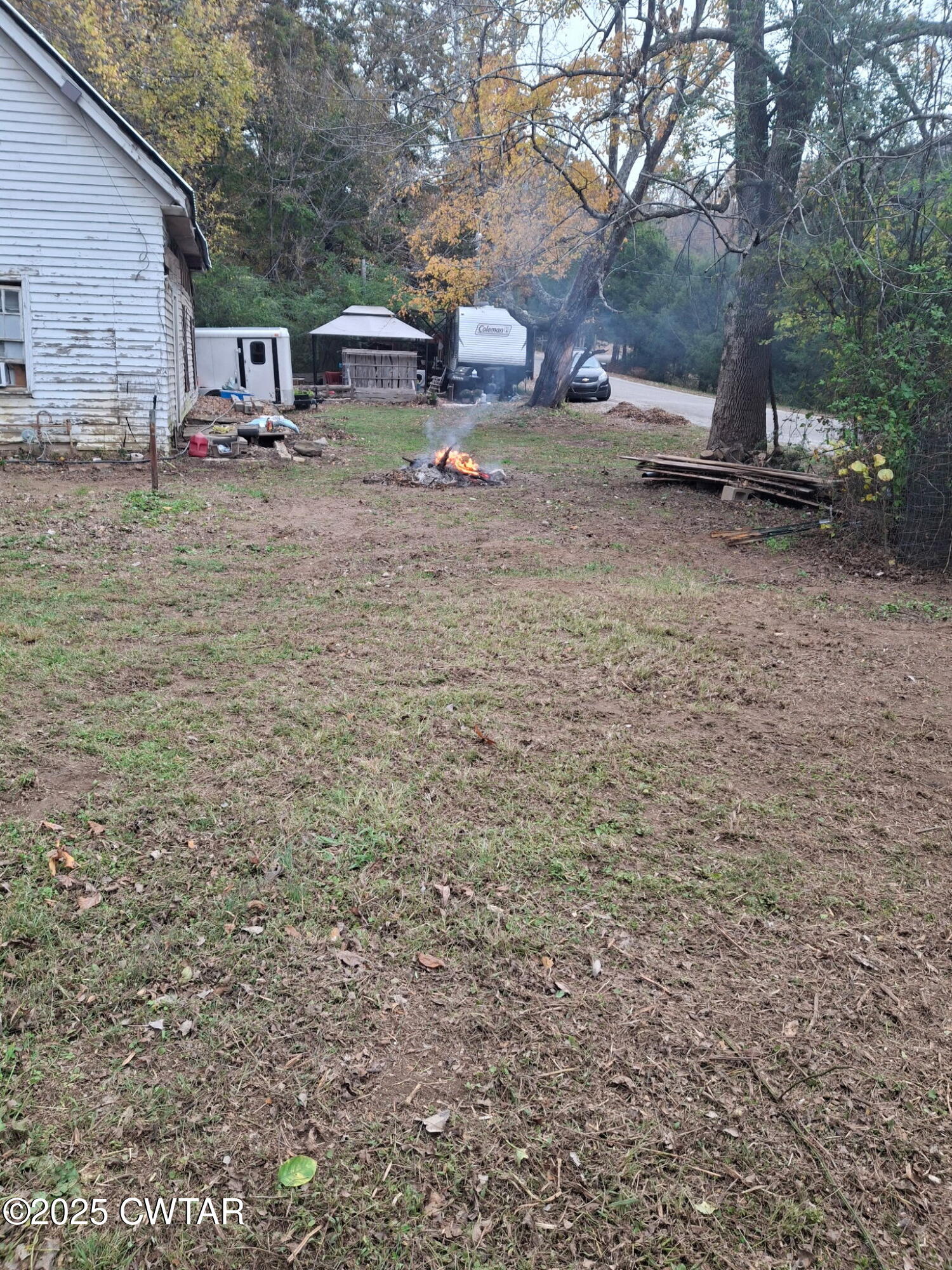 555 Center Point Road South Reagan, TN 38368 - Photo 10 of 17 a backyard of a house with barbeque oven