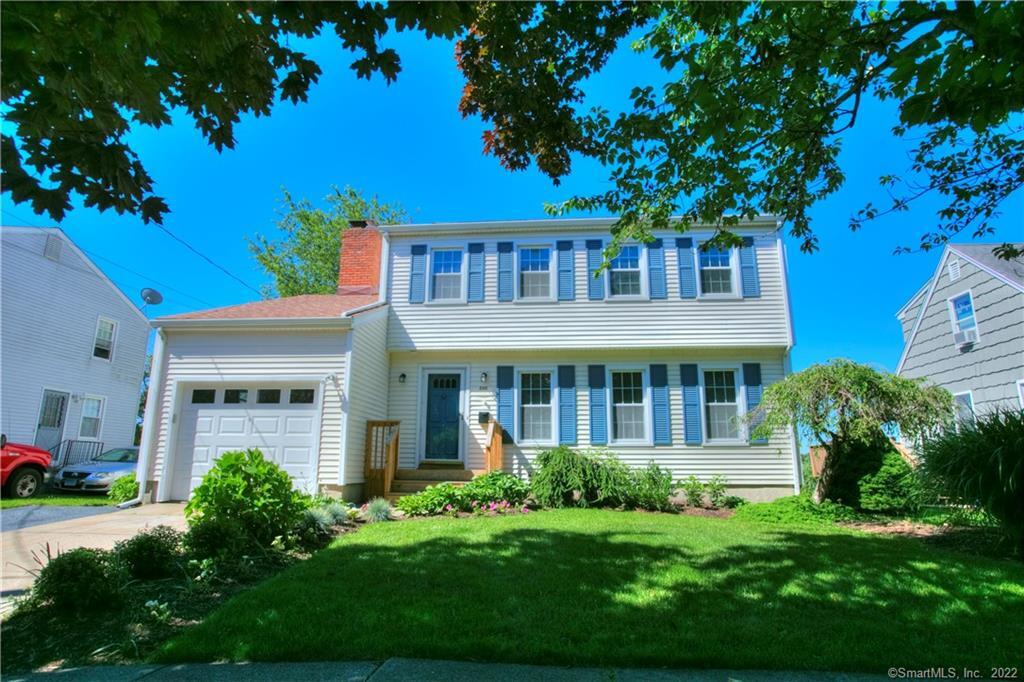 Just as cute as a button, this vinyl sided colonial is low maintenance and located on a quiet cul de sac just minutes from downtown and the beach.