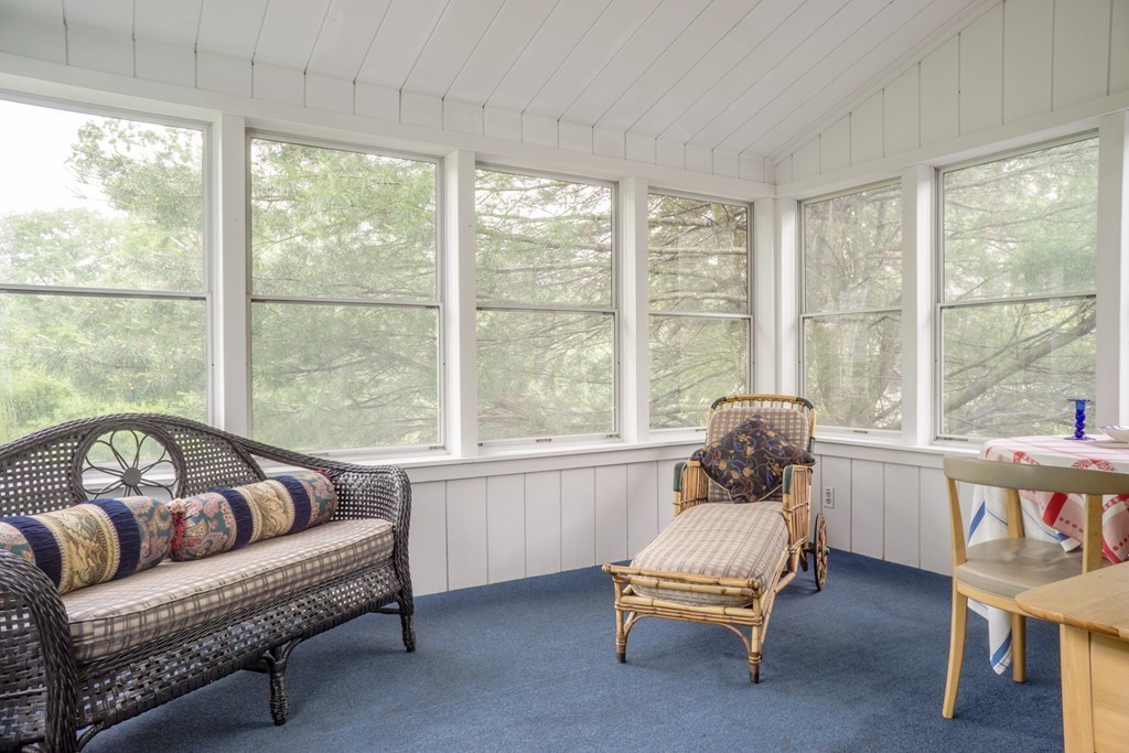 500 Lexington Road Concord, MA 01742 - Photo 11 of 14 a living room with furniture and a large window