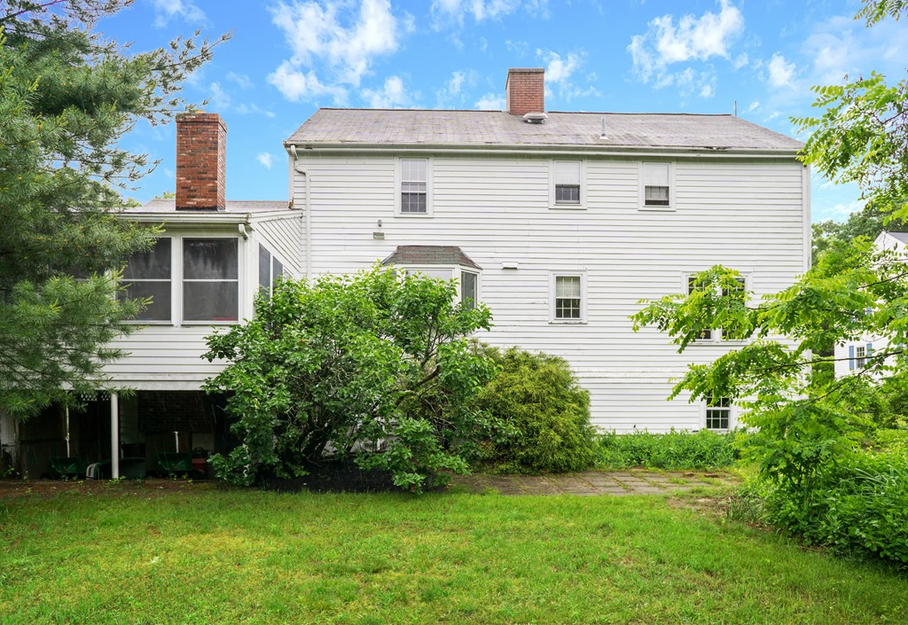 500 Lexington Road Concord, MA 01742 - Photo 13 of 14 a view of a house with a yard