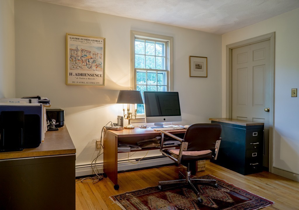 500 Lexington Road Concord, MA 01742 - Photo 9 of 14 a view of a workspace with furniture and a window