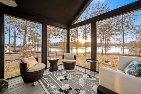 a view of a yard with table and chairs