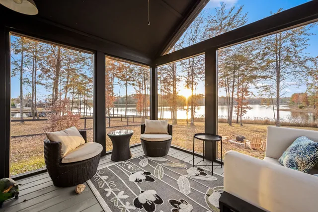 a view of a yard with table and chairs