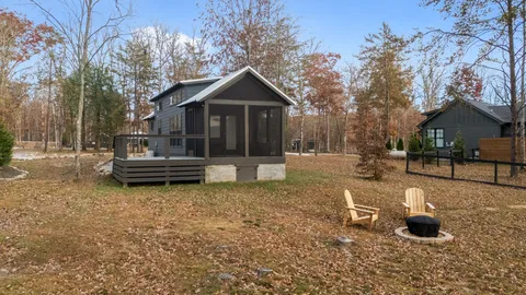 a bedroom with a bed and a walk in closet