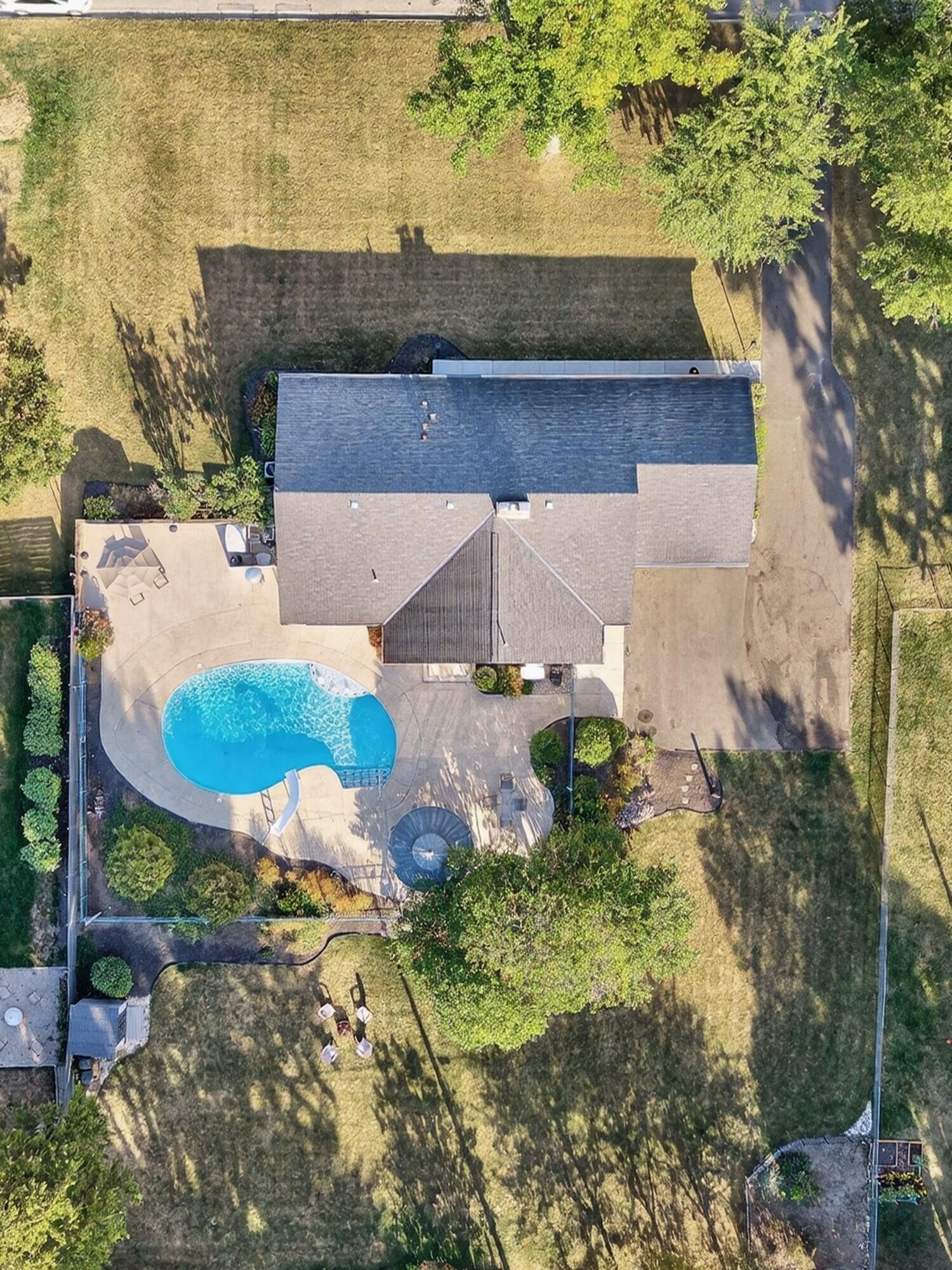3347 Colchester Road Columbus, OH 43221 - Photo 26 of 42 Over a half acre plot with gorgeous mature landscaping. Plenty of room for a full sized Volleyball court. The power lines are buried for plenty of room to play.