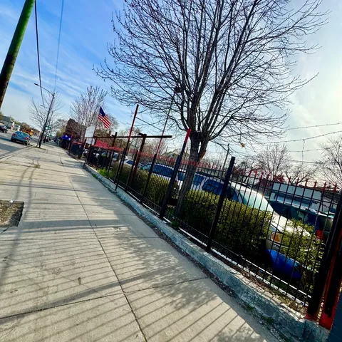a view of a street with trees on both side of street