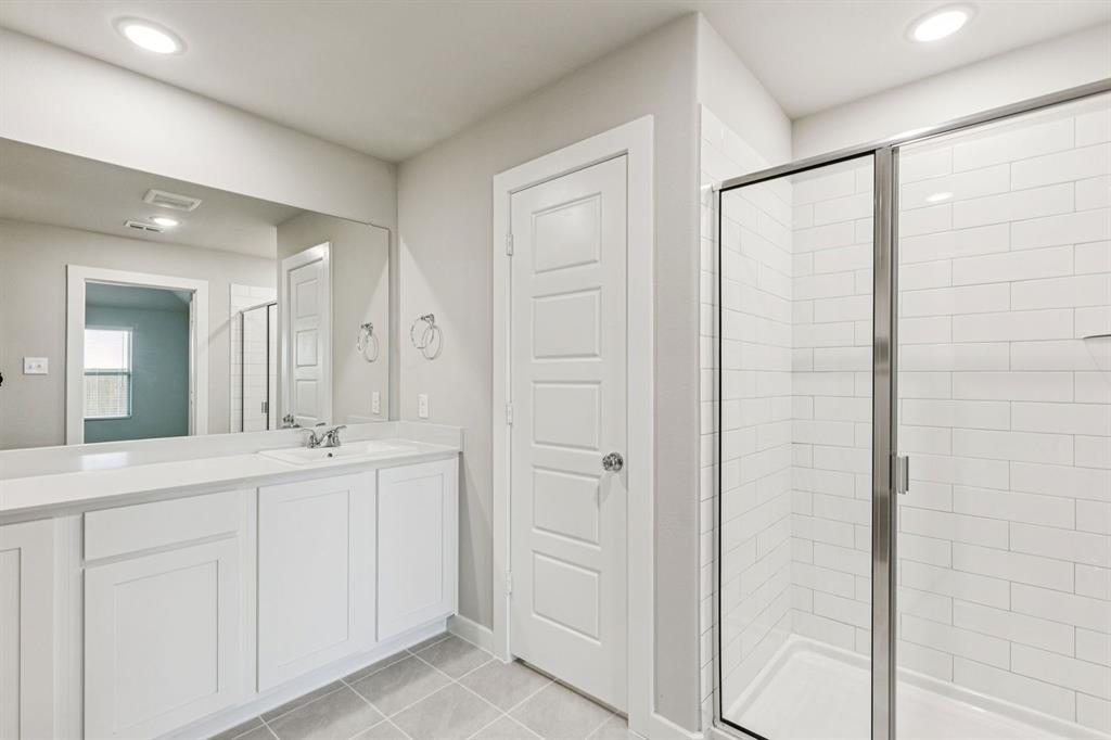 1184 Nora Lane Forney, TX 75126 - Photo 17 of 27 Primary Bathroom in the Harper home plan by Trophy Signature Homes – REPRESENTATIVE PHOTO