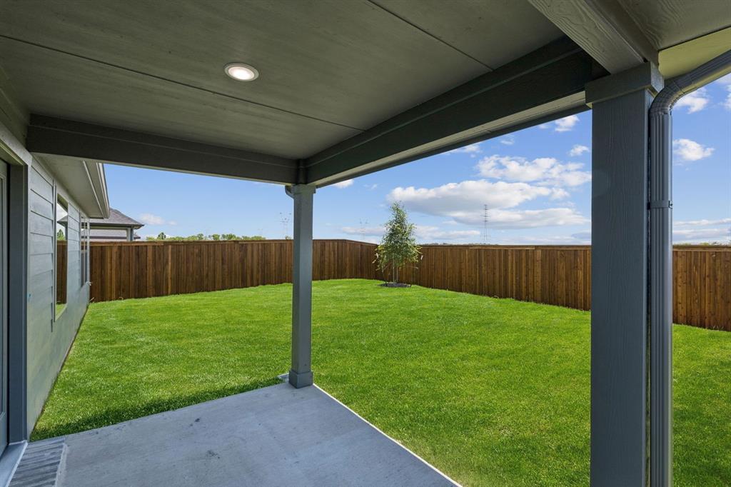 1184 Nora Lane Forney, TX 75126 - Photo 24 of 27 Patio in the Harper home plan by Trophy Signature Homes – REPRESENTATIVE PHOTO