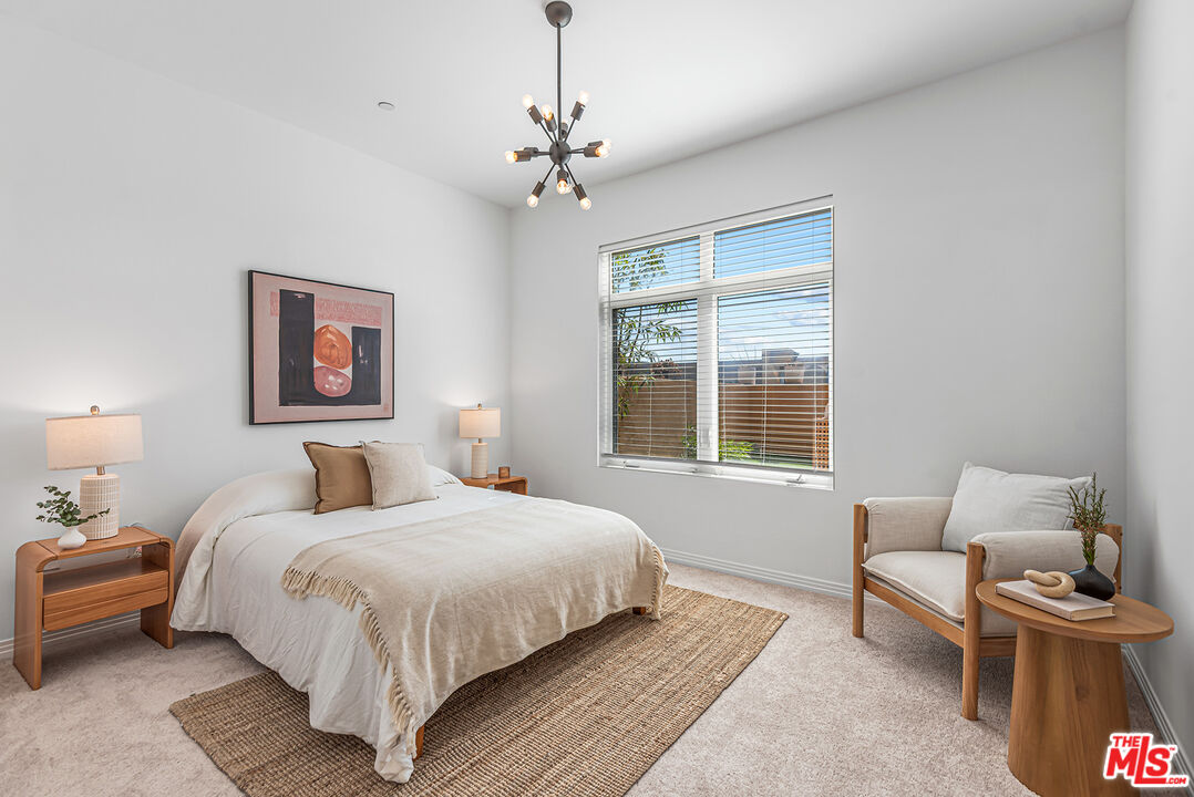 4050 Glencoe Avenue, Unit 414 Marina del Rey, CA 90292 - Photo 19 of 31 a bedroom with a bed and a window