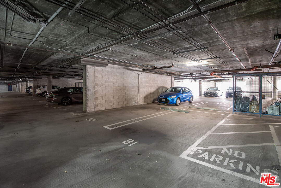 4050 Glencoe Avenue, Unit 414 Marina del Rey, CA 90292 - Photo 23 of 31 a outdoor space with lots of cars parked