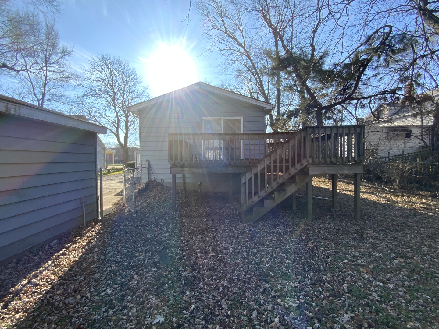 321 West Joe Orr Road Chicago Heights, IL 60411 - Photo 32 of 36 a backyard of a house with table and chairs