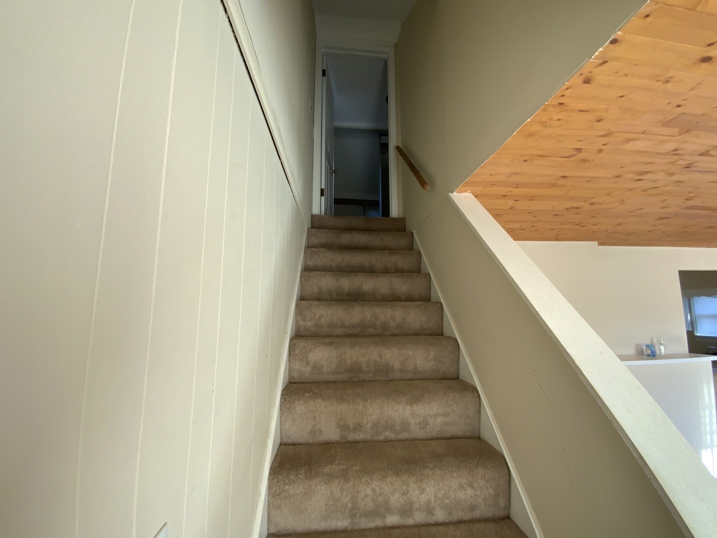 321 West Joe Orr Road Chicago Heights, IL 60411 - Photo 7 of 36 a view of staircase with wooden floor and white walls