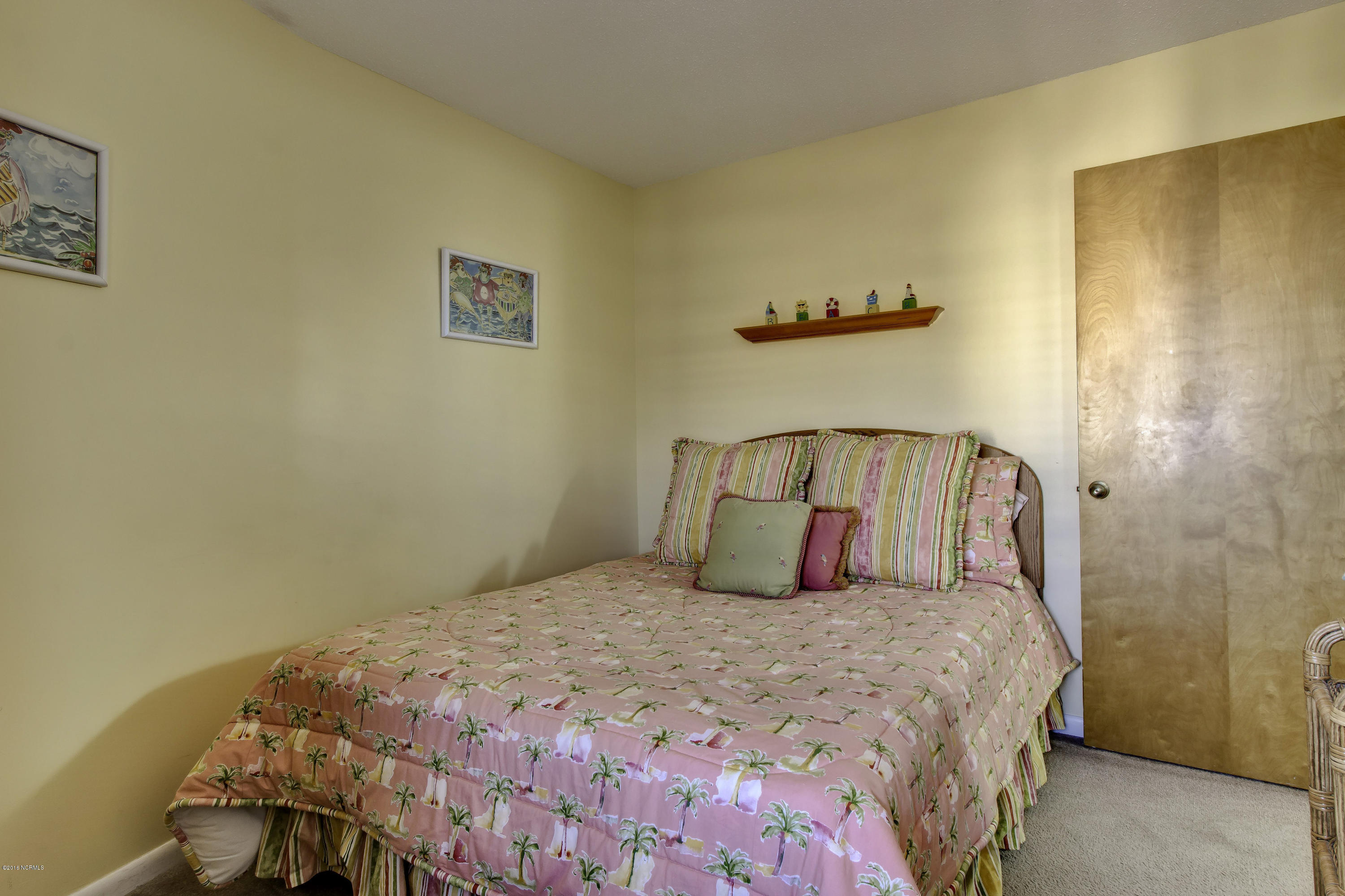 1505 Salter Path Road, Unit 508 Indian Beach, NC 28512 - Photo 12 of 15 Guest bedroom 1.. Full bath is in hall just outside bedroom.