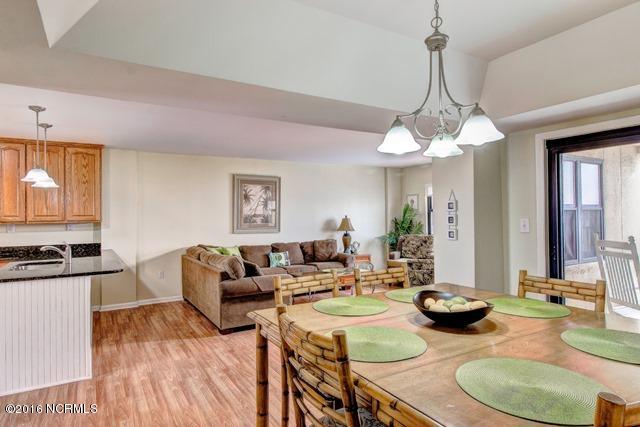 1505 Salter Path Road, Unit 508 Indian Beach, NC 28512 - Photo 3 of 15 Open living & dining area. Popcorn removed from ceiling