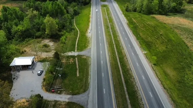 a view of swimming pool from a balcony