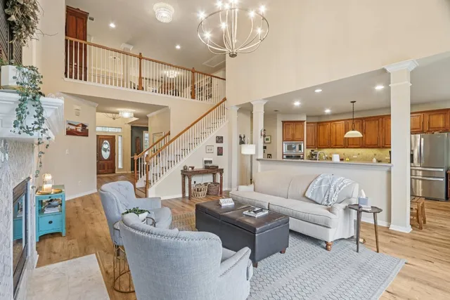 a dining room with furniture and window