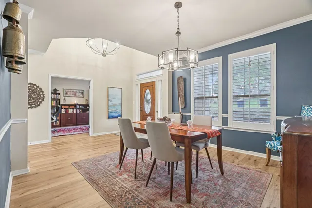 a bathroom with a shower and a tub