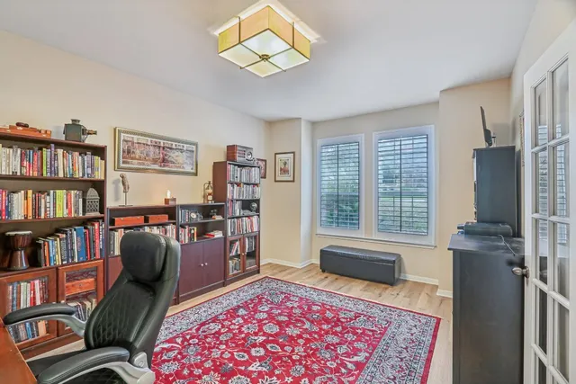 a view of walk in closet with clothes