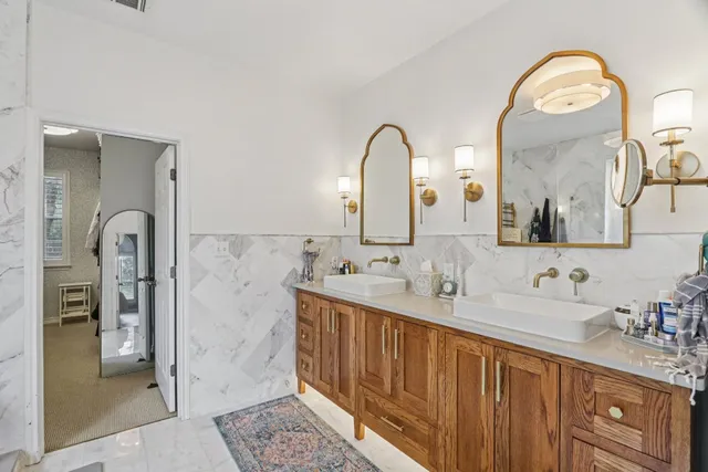 a bedroom with furniture and a bed