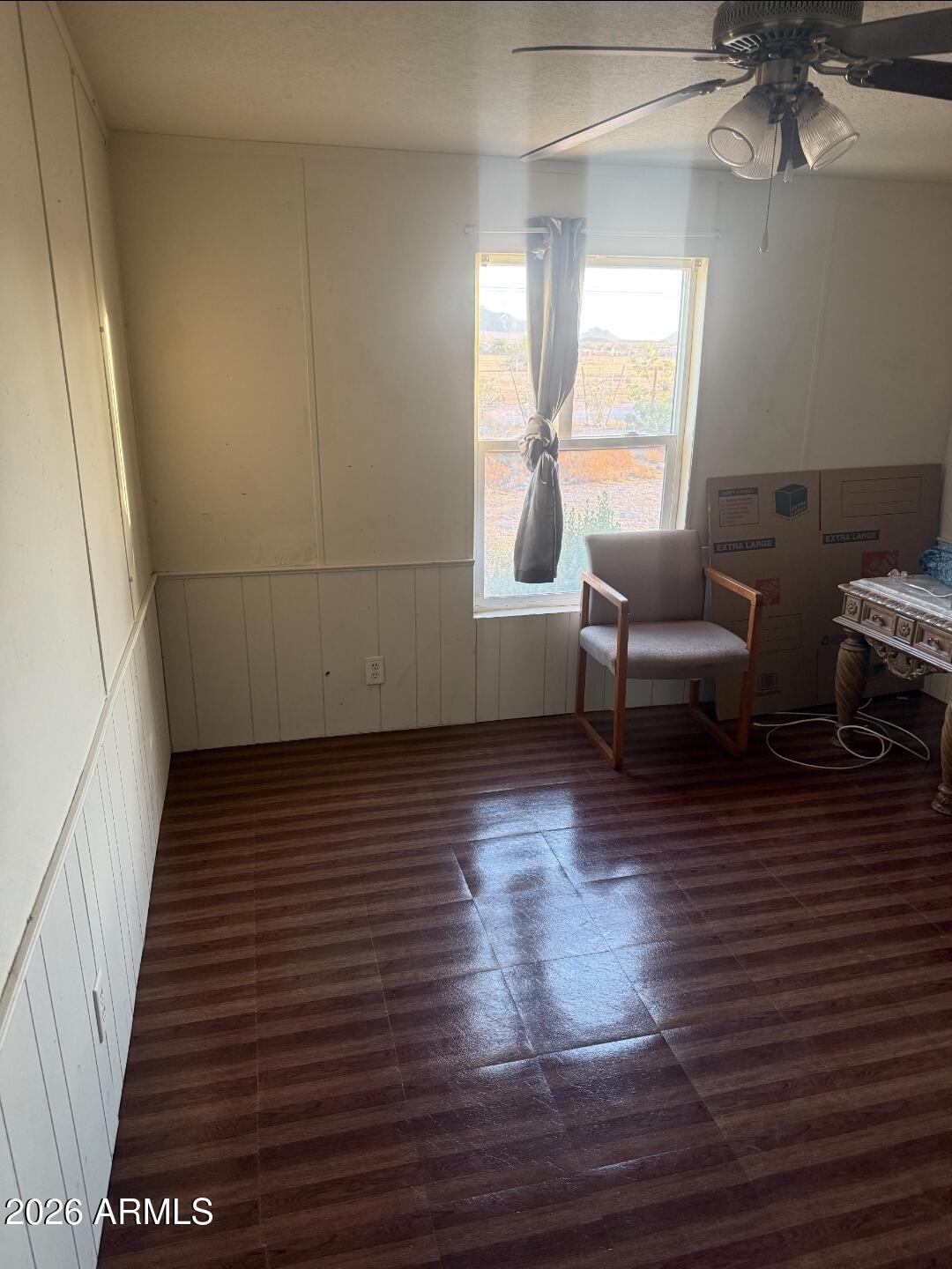2625 Saddle Vista Road Tonopah, AZ 85354 - Photo 15 of 19 a view of a room with wooden floor and windows