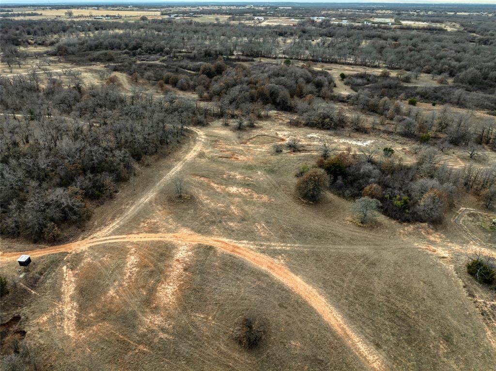 0 Turpin Lake Road Poolville, TX 76487 - Photo 12 of 18 an aerial view of residential houses with outdoor space