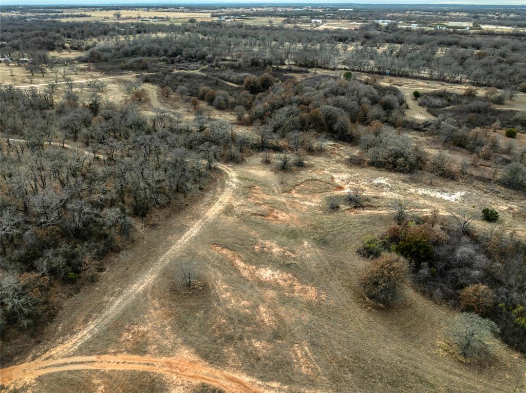 0 Turpin Lake Road Poolville, TX 76487 - Photo 13 of 18 a view of a yard with trees in back