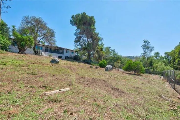 265 Wilkinson Drive San Marcos, CA 92078 - Photo 19 of 34 a view of a yard with a tree