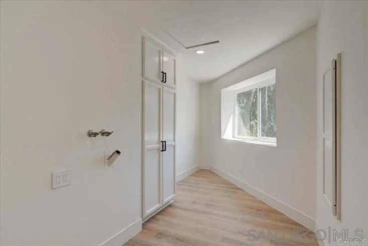 265 Wilkinson Drive San Marcos, CA 92078 - Photo 22 of 34 a view of a bathroom from the hallway