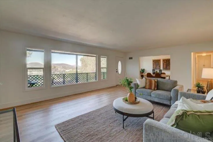 265 Wilkinson Drive San Marcos, CA 92078 - Photo 23 of 34 a living room with furniture and a large window