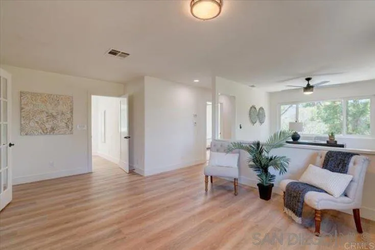265 Wilkinson Drive San Marcos, CA 92078 - Photo 25 of 34 a living room with furniture and a large window